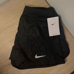 Black Nike cheetah shirts size small